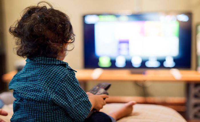 young indian boy watching television 53876 13367